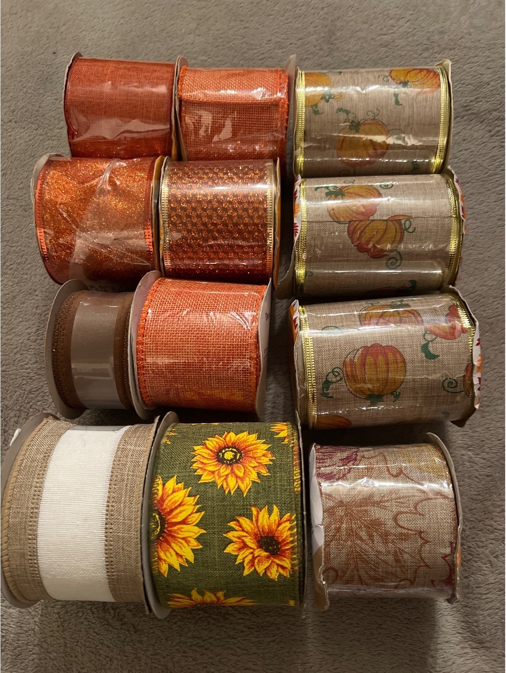 Assorted Decorative Ribbon Rolls with Fall and Sunflower Designs
